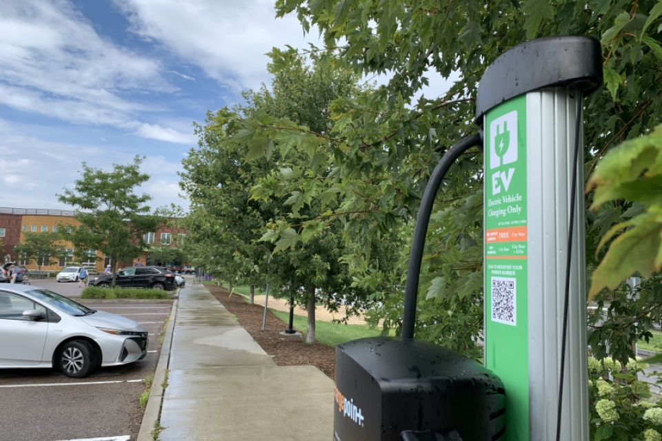 A photo of a ChargePoint EV charging station outside the South End City Market location.